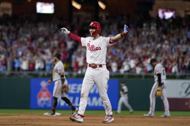 The Phillies’ Trea Turner celebrates after hitting a game-winning two-run single against San Francisco Giants pitcher Camilo Doval during the ninth inning Tuesday, Aug. 22, 2023, in Philadelphia. (Matt Slocum / ASSOCIATED PRESS)